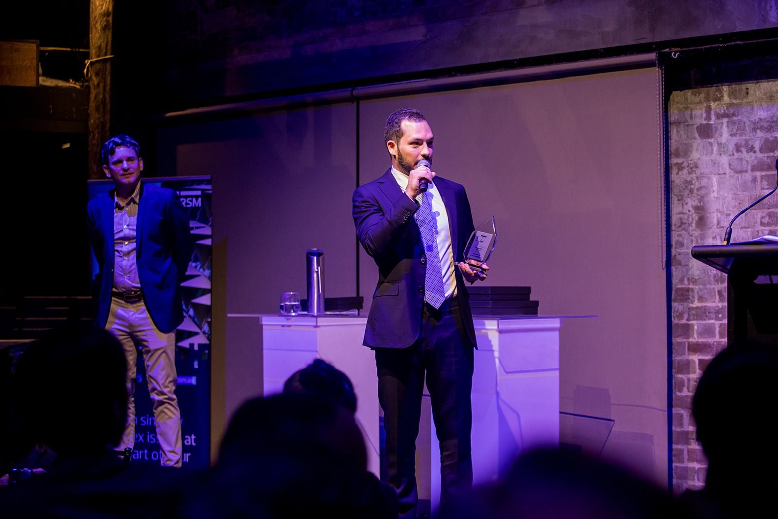 2025 Sydney Young Entrepreneur Awards Gala dinner Winners accepting trophies on stage at the 2025 Sydney Young Entrepreneur Awards